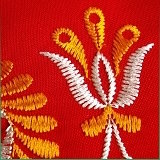 Detail ručnej výšivky
